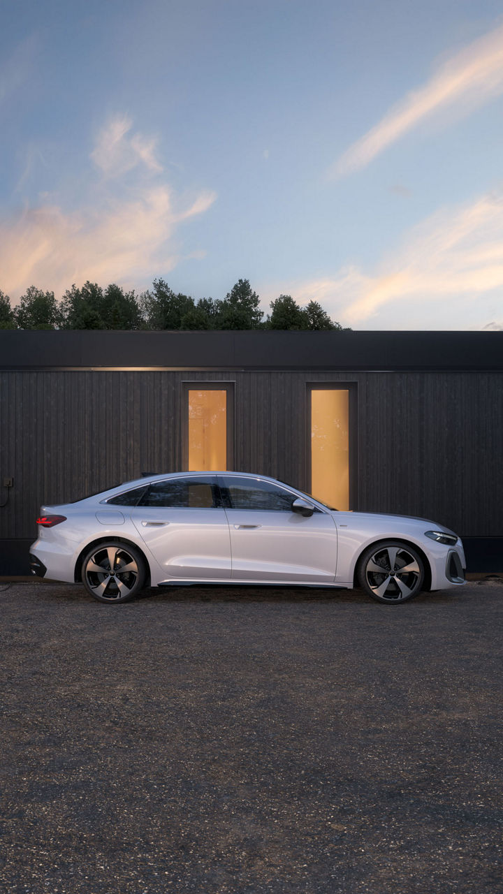 Ein Mann läuft zu einem weißen Audi