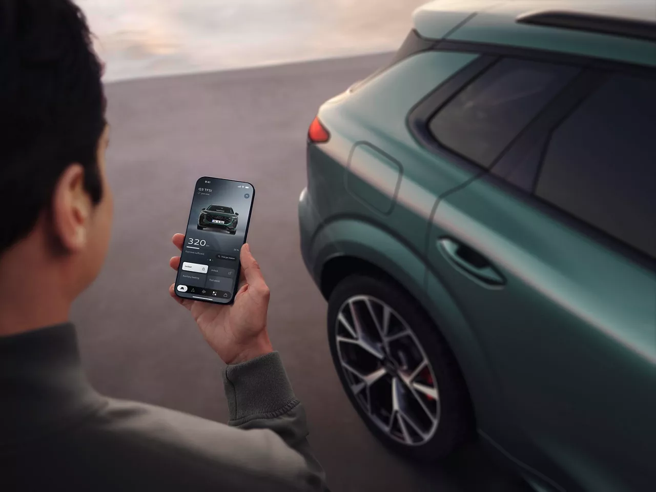 Audi Connect and Functions on Demand Store on myAudi App with Audi Q3 in the background