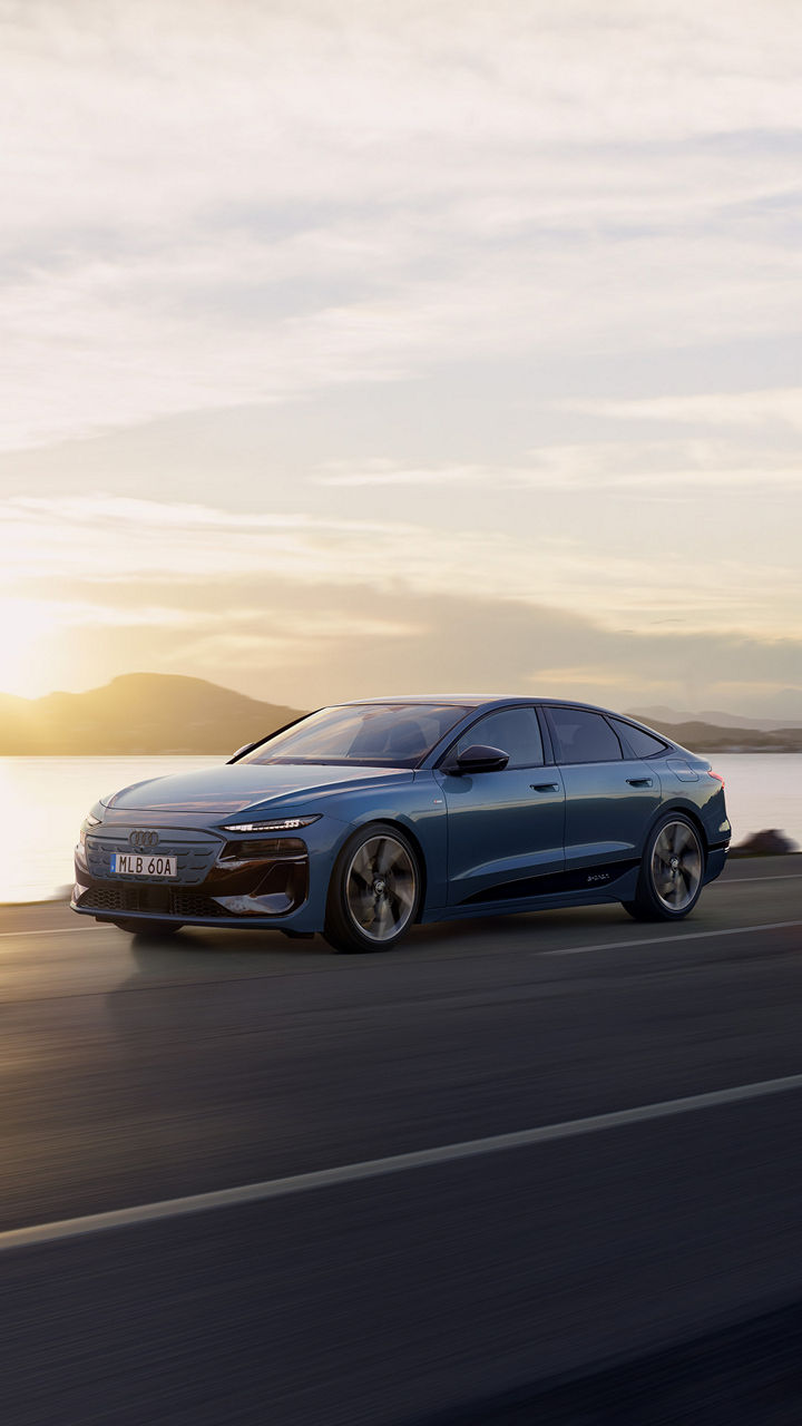 A6 e-tron kör vid vattnet i solnedgången.