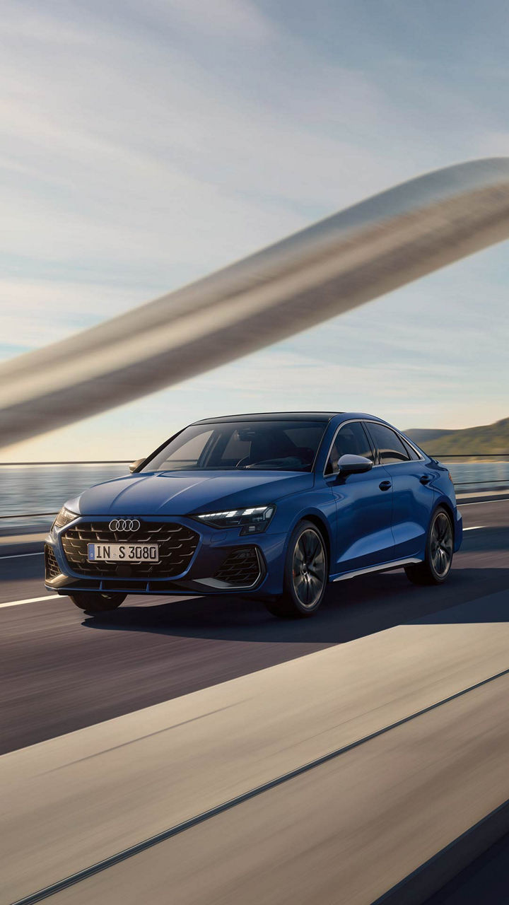 Dynamic view of the Audi S3 Sedan on a bridge