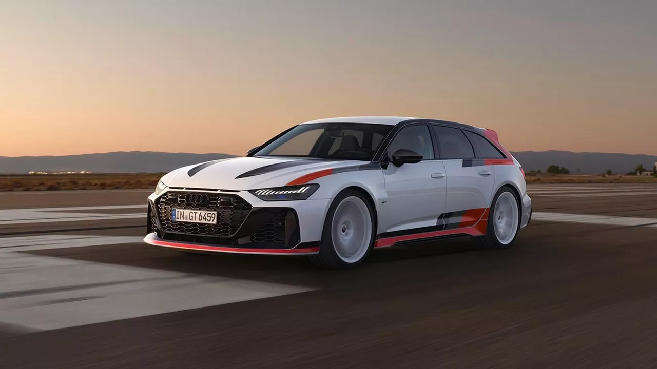 White sport A6 Avant with red details driving