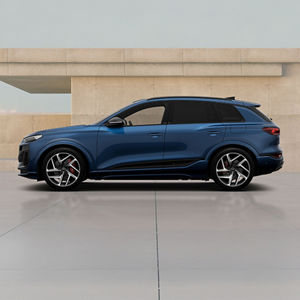 Left side of a charcoal SQ6 e-tron Audi vehicle 