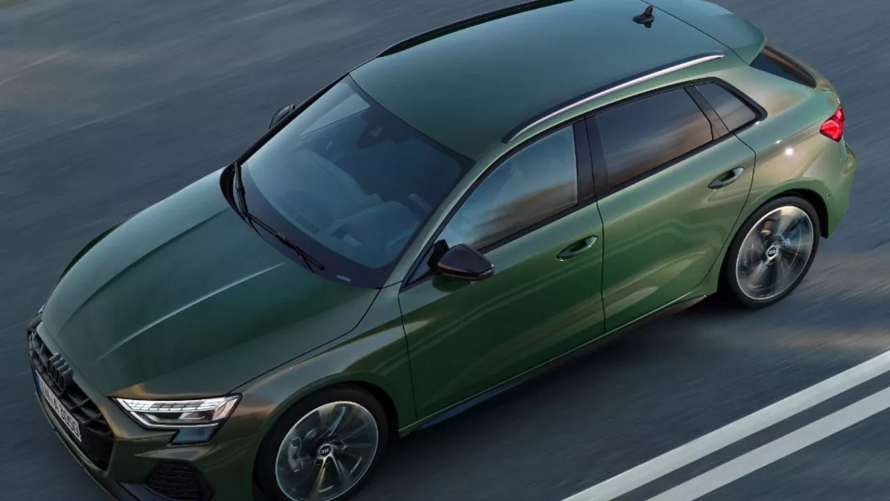 Dark Green Audi A3 Sportback on the road