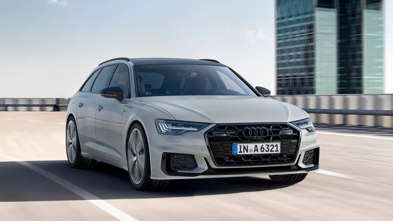 Light grey Audi A6 Avant on a city highway