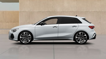 White A3 sportback next to beige wall