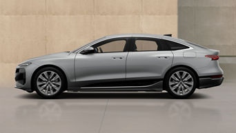 grey A6 Sportback e-tron against a beige concreate wall