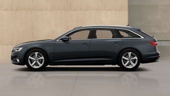 A6 Avant parked aside a modern beige stone building