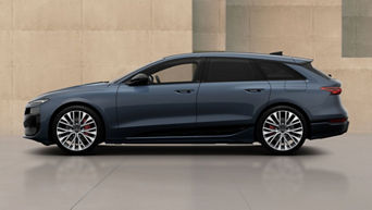 metallic A6 avant besides a beige stone modern wall
