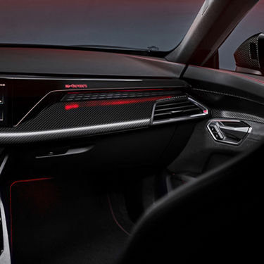 Interior of an Audi car with emphasis on the dashboard details on the passenger side seat