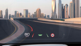Heads up display of an Audi car showing digital numbers