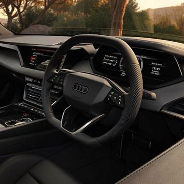 Close up to a steering wheel of an Audi car