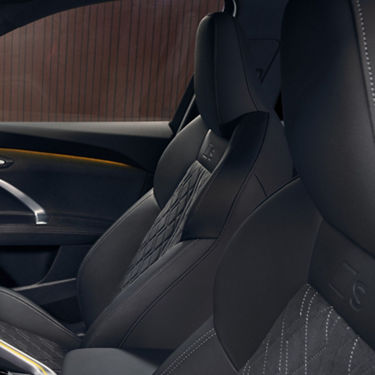 Interior shot of an Audi SUV, focused on seats.