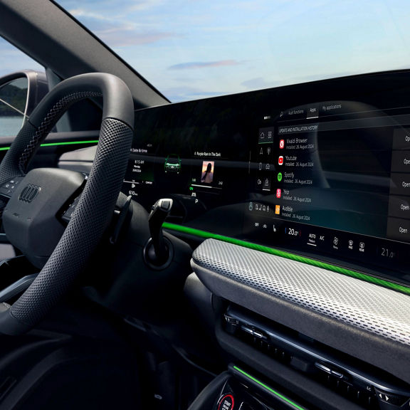 Close-up of an Audi touchscreen infotainment system.