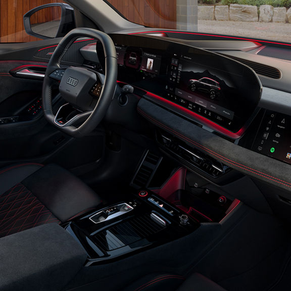 Interior of an Audi car driver's dashboard with emphasis on the technology details