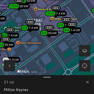 Map showing Milton Keynes with several Audi charging stations marked. Each station lists available slots and kW ratings. Nearby landmarks include Melis Restaurant and Marks & Spencer.