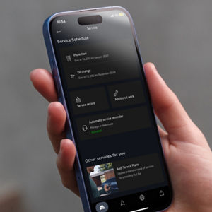 A woman using the myAudi app