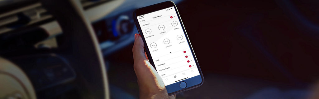  A hand holding a mobile phone that is displaying the Connect Plug and Play app