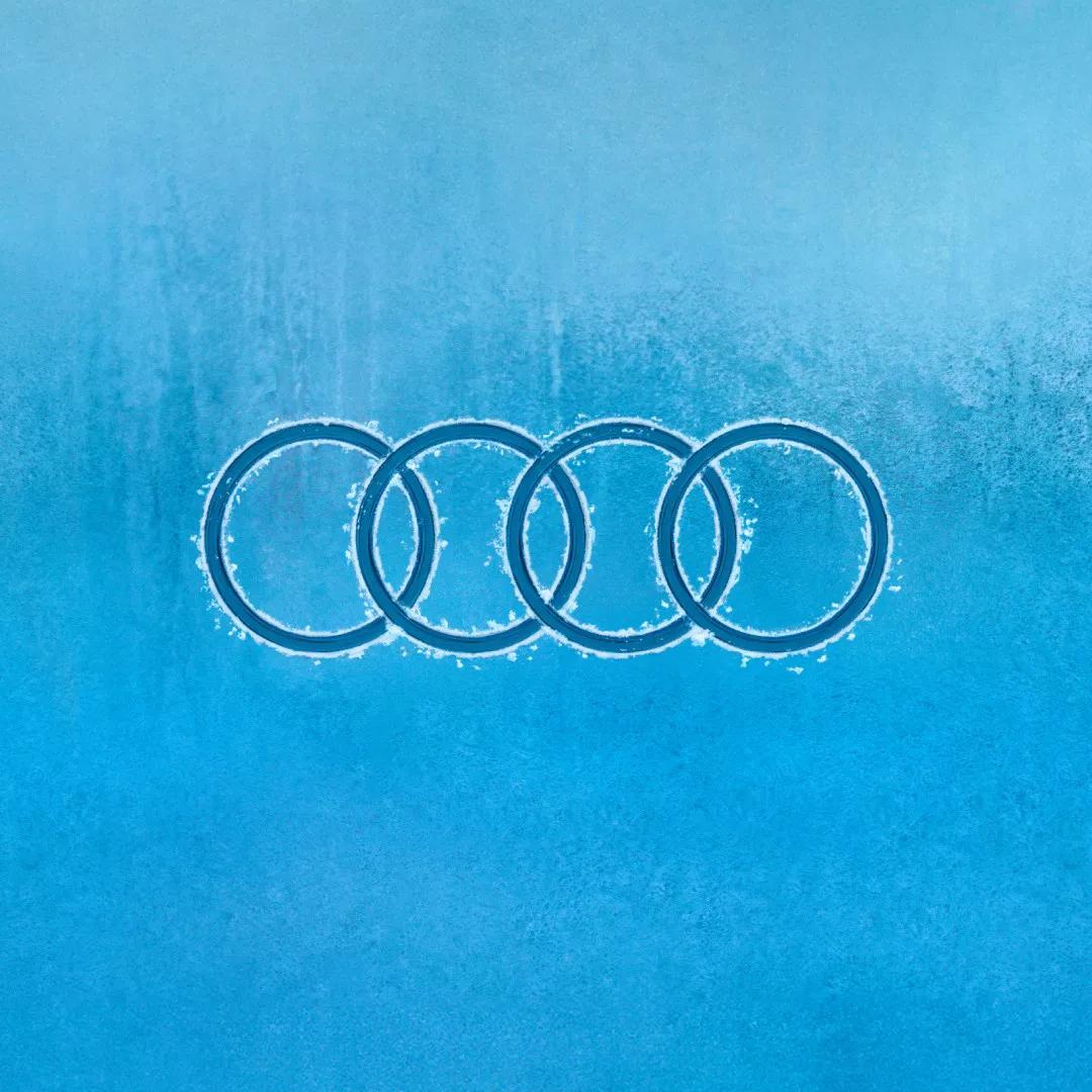 Frozen Audi rings on an ice blue background