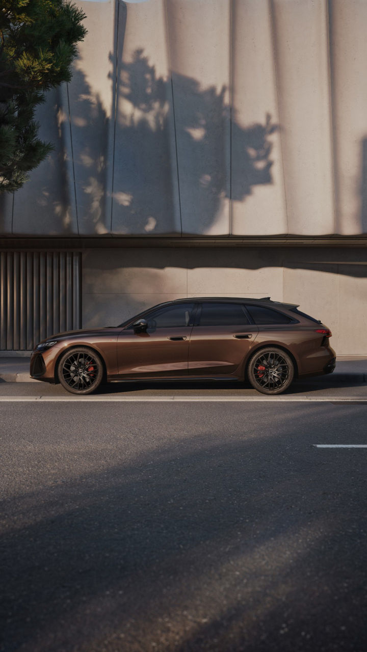 Brown Audi A6 Avant from the side