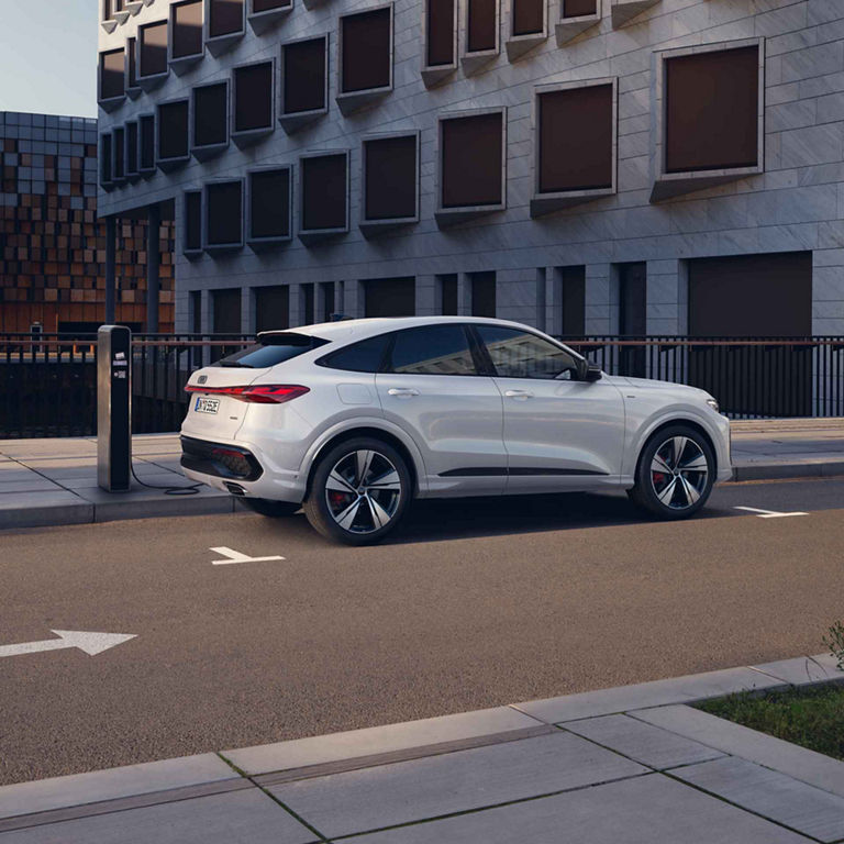 Audi Q5 Sportback e-hybrid side view during charging
