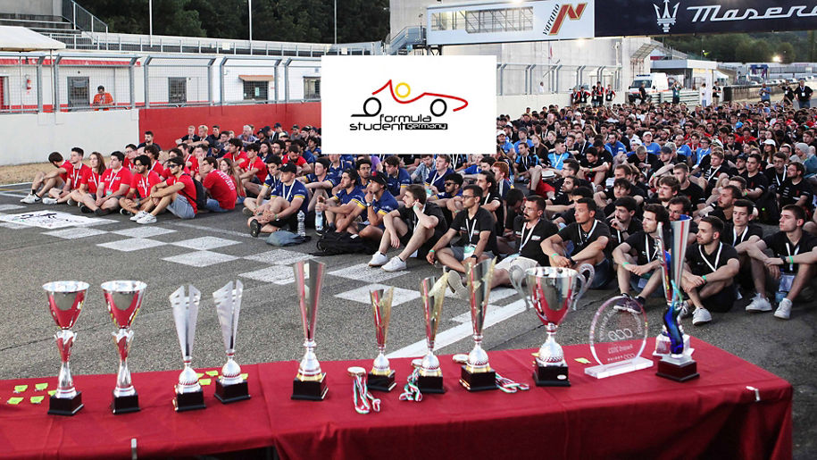 A group of students sits on a start range at the formula student event