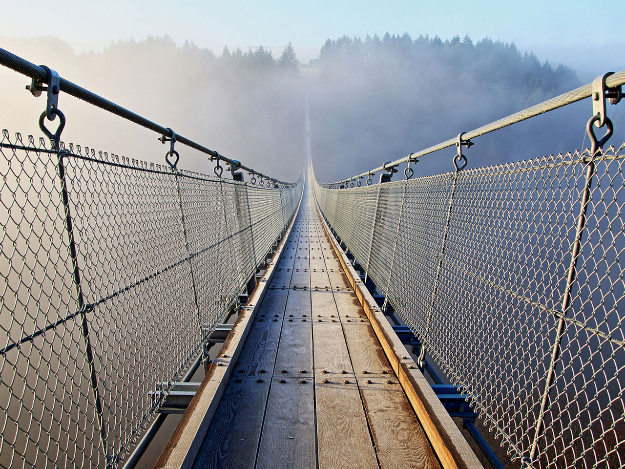 Suspension bridge in the fog