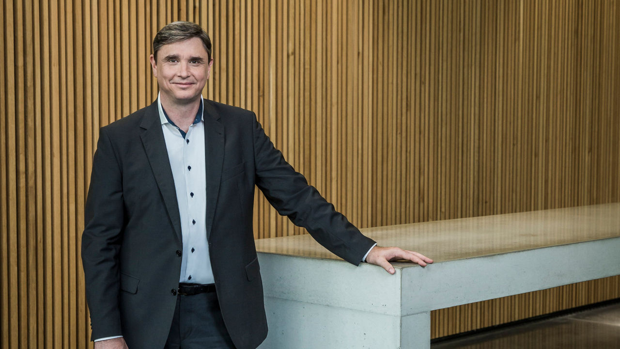 Jürgen Rittersberger, Member of the Board of Management of AUDI AG, Finance and Legal Affairs looks into the camera