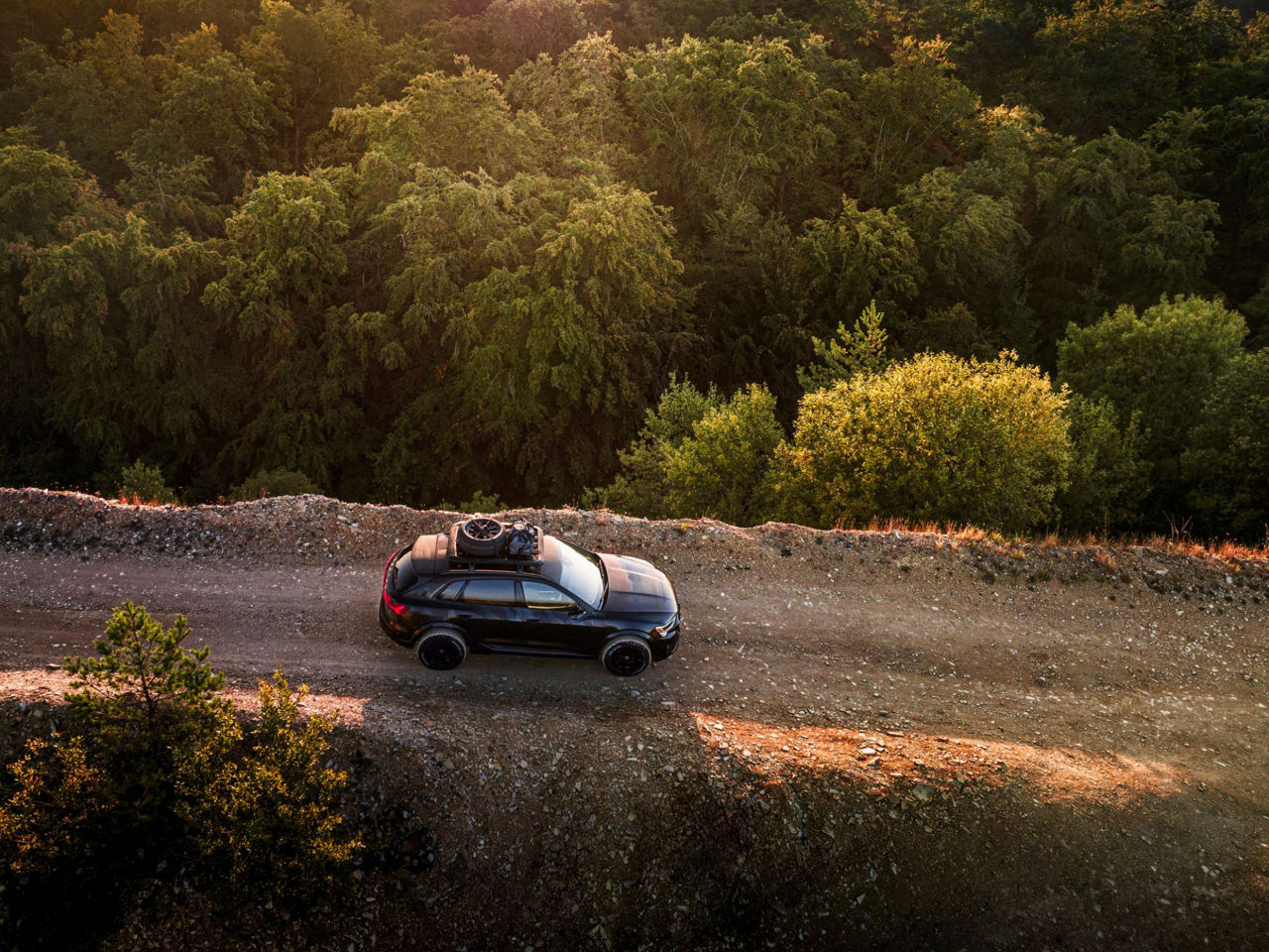 Audi model on a sandy road from a bird's eye view