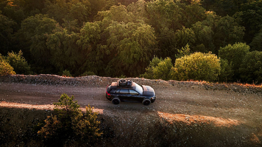 Audi model on a sandy road from a bird's eye view
