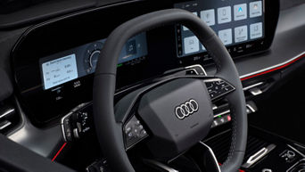 The interior of the new Audi Q3 with panoramic display and illuminated door panels