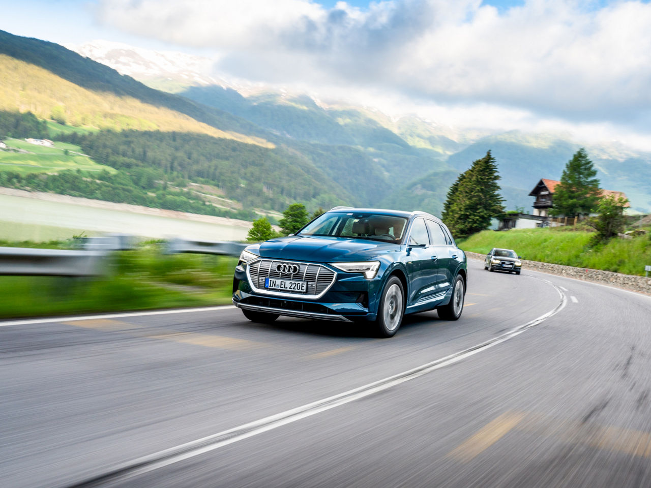 Audi e-tron driving on a country road