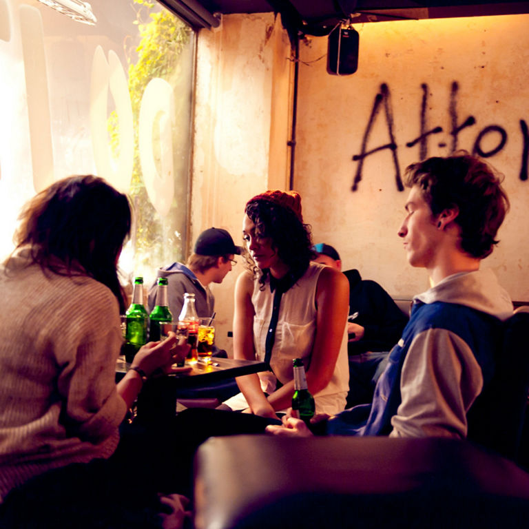 Young people sitting in a café