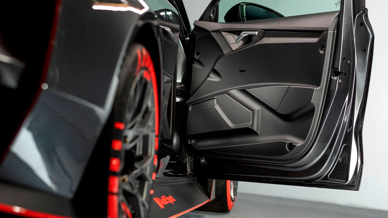 A picture showing the door of the Audi RS 3 LMS race car.