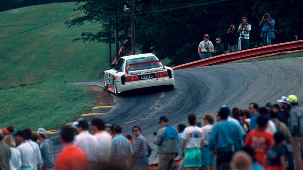 A picture showing an Audi 90 quattro IMSA GTO race car on track in the USA in 1989.