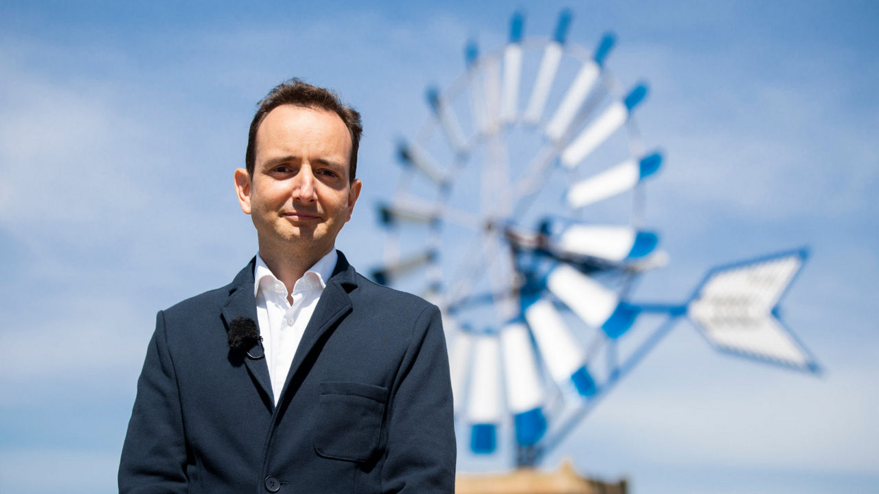 Audi developer Francisco Trigueros Morera de la Vall in front of a windmill