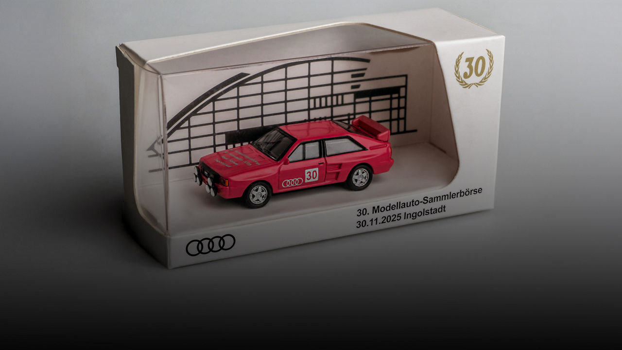 Rotes Audi-Modellauto in Verpackung mit Aufdruck „30. Modellauto-Sammlerbörse, 30.11.2025 Ingolstadt“.