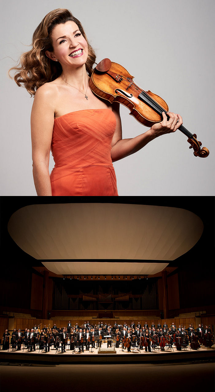 Porträt der Geigerin Anne-Sophie Mutter mit Geige, darunter das Royal Philharmonic Orchestra stehend auf einer Konzertbühne.
