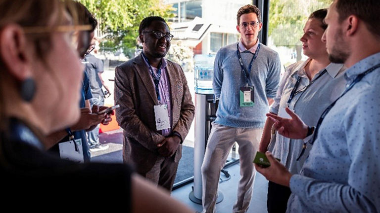 Teilnehmer_innen beim Greentech Festival