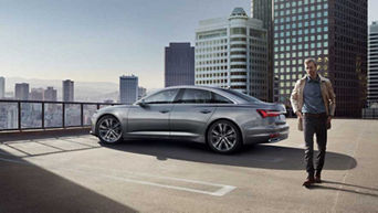 Audi financial services - Image of Classic M4 BG Sedan in a parking lot