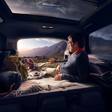 Man Sitting in Audi Q3 Boot – Audi Australia