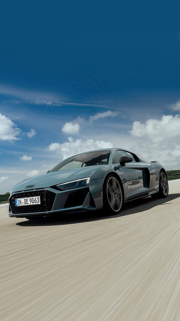 Gray Audi R8 Coupé V10 performance quattro on the race track