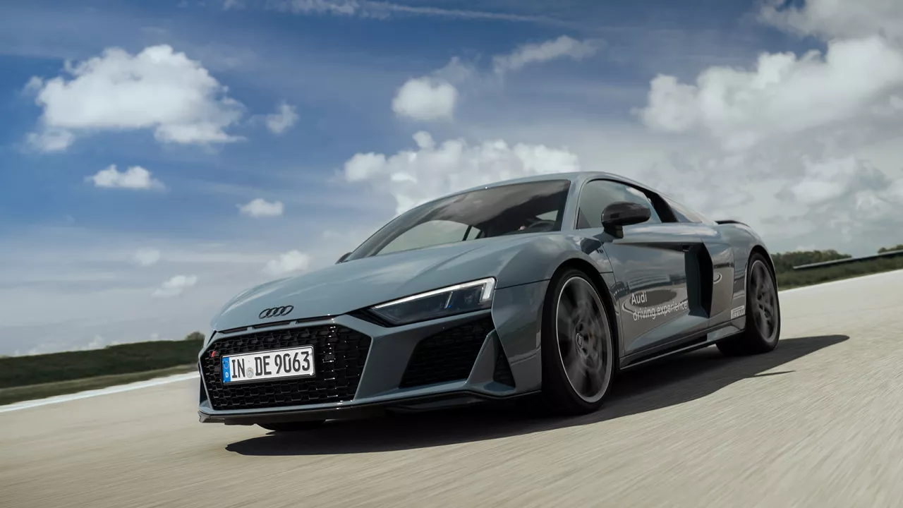 Gray Audi R8 Coupé V10 performance quattro on the race track