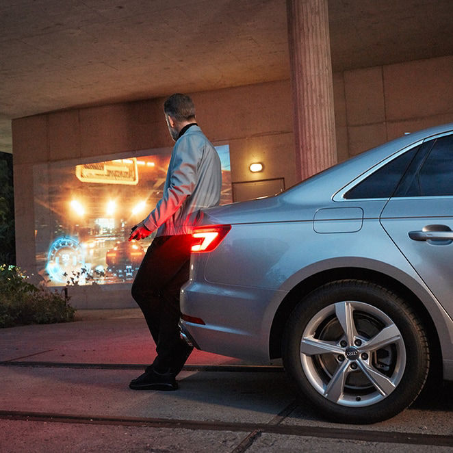 Man leaning on car 