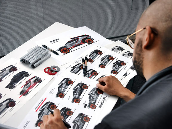 Sketches and drawings of the Audi RS Q e-tron.
