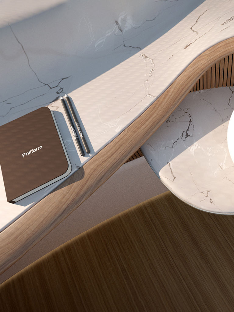 Un bloc-notes avec un stylo et une lampe ronde sont posés sur une table dans le design intérieur de l'Audi urbansphere concept réalisé par Poliform.