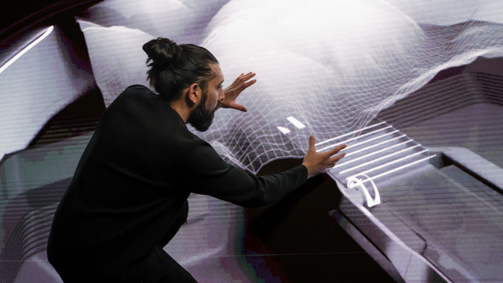 Sid Odedra describing a digital projection.