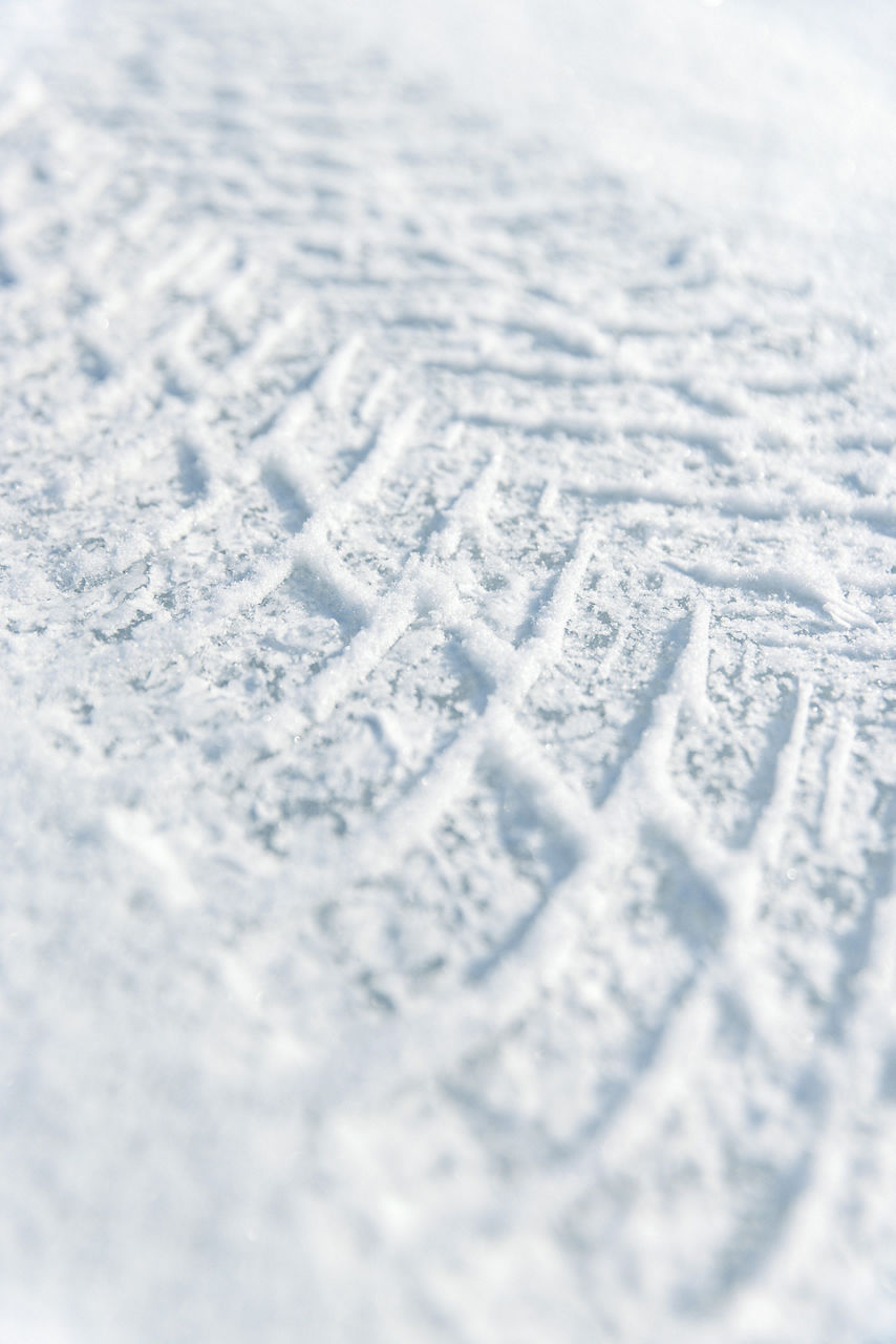 Tyre tracks in the snow.