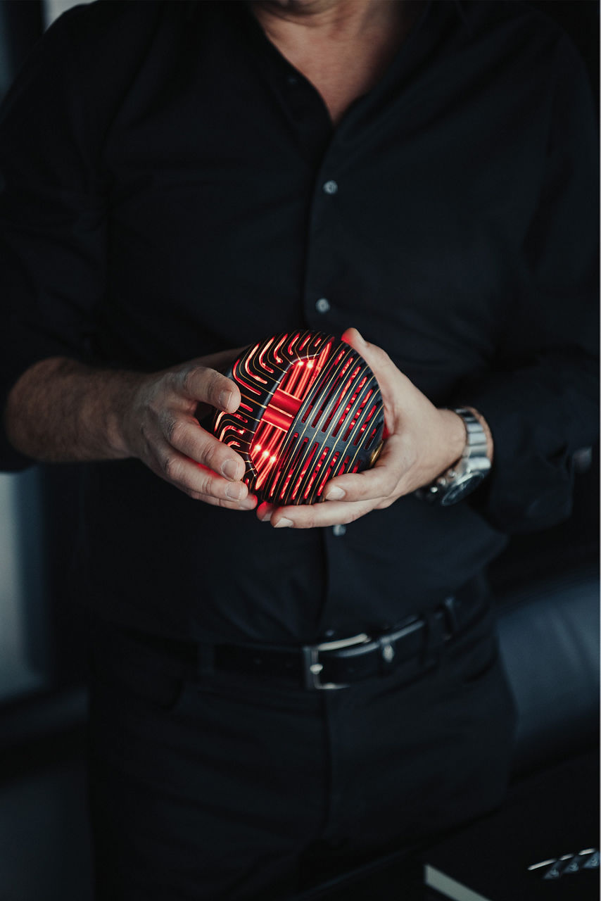 A luminous sphere in César Muntada’s hands.