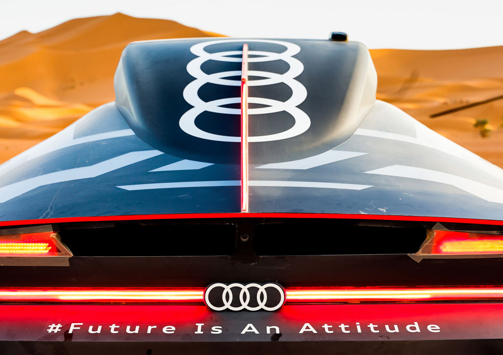 View of a desert landscape across the rear of the Audi RS Q e-tron.