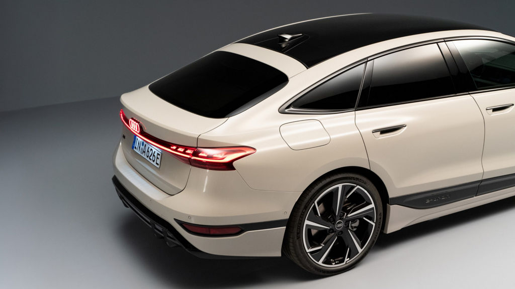 Oblique view of the rear section of the Audi A6 Sportback e-tron. All windows are darkened.